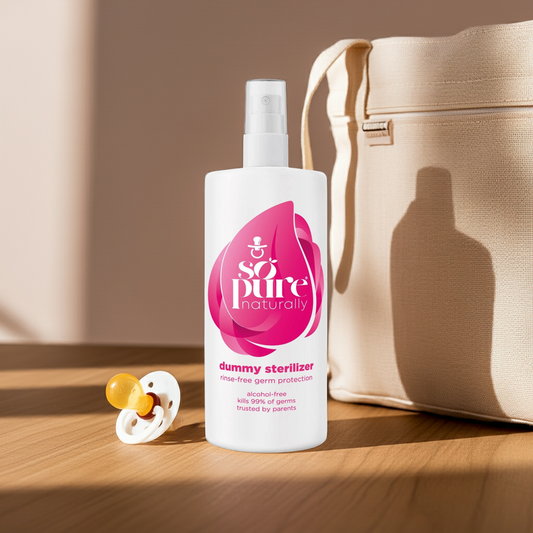 Bottle of 'so pure' dummy sterilizer with a pacifier and beige bag on a wooden surface.