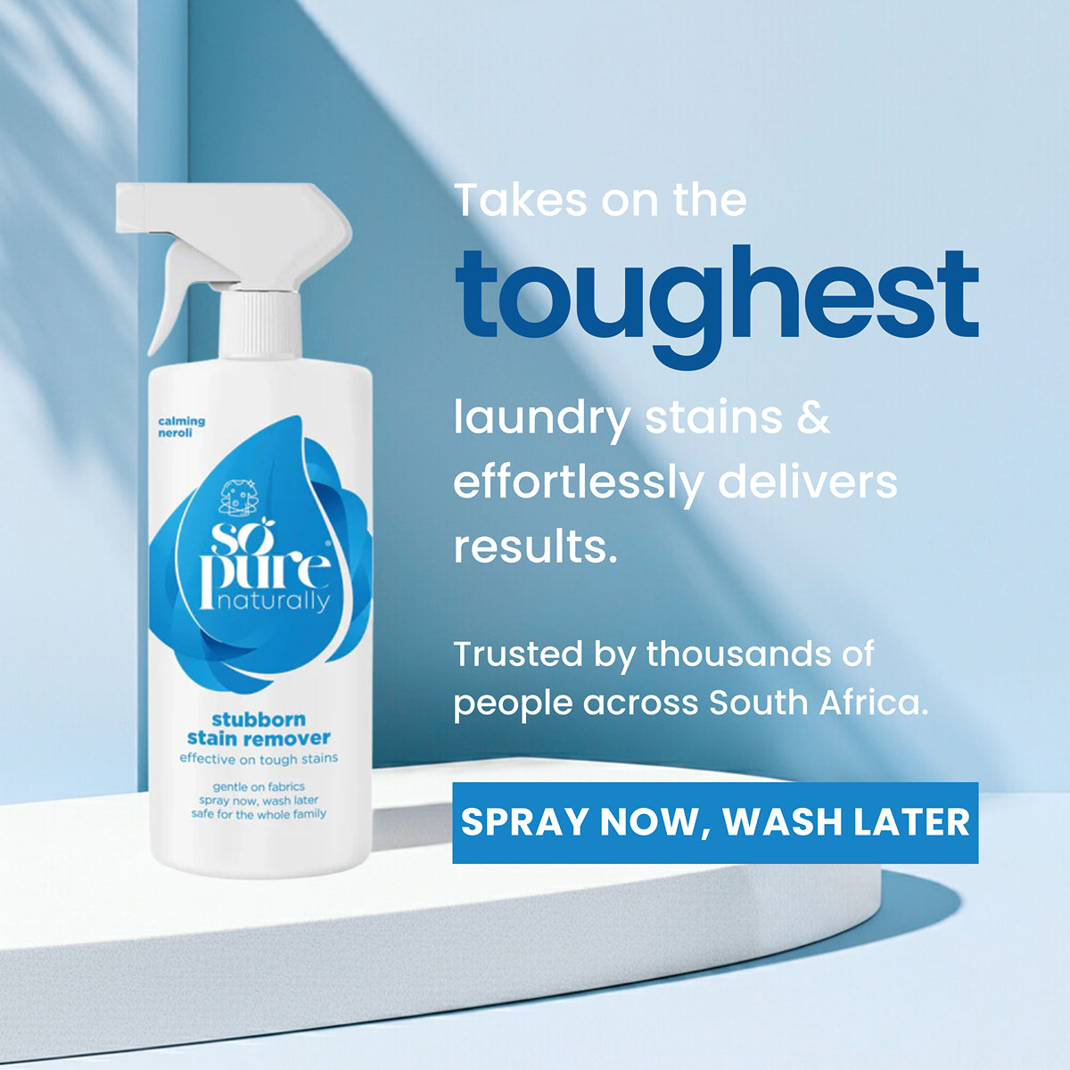 Stain remover spray bottle with text on a blue background